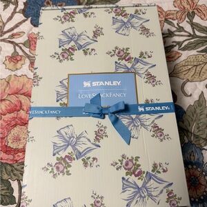Stanley Floral Gift Box with Blue Ribbon and Purple Blooms